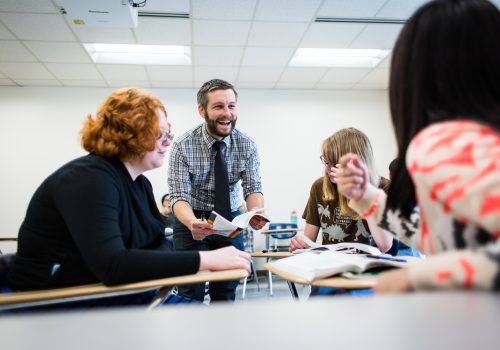 students and a professor in class